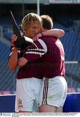 THE MAN: Ciaran McDonald is congratulated by team captain Tom Nallen after picking up the Man of the Match award after Crossmolina defeated Nemo Rangers in the 2001 All-Ireland Club Final.
